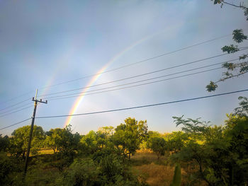 Low angle view of rainbow against sky