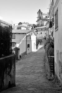 Narrow alley amidst buildings in town