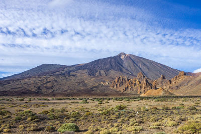 Scenic view of volcanic landscape against sky