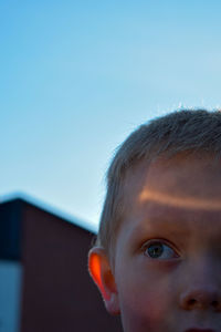 Close-up portrait of boy looking at camera
