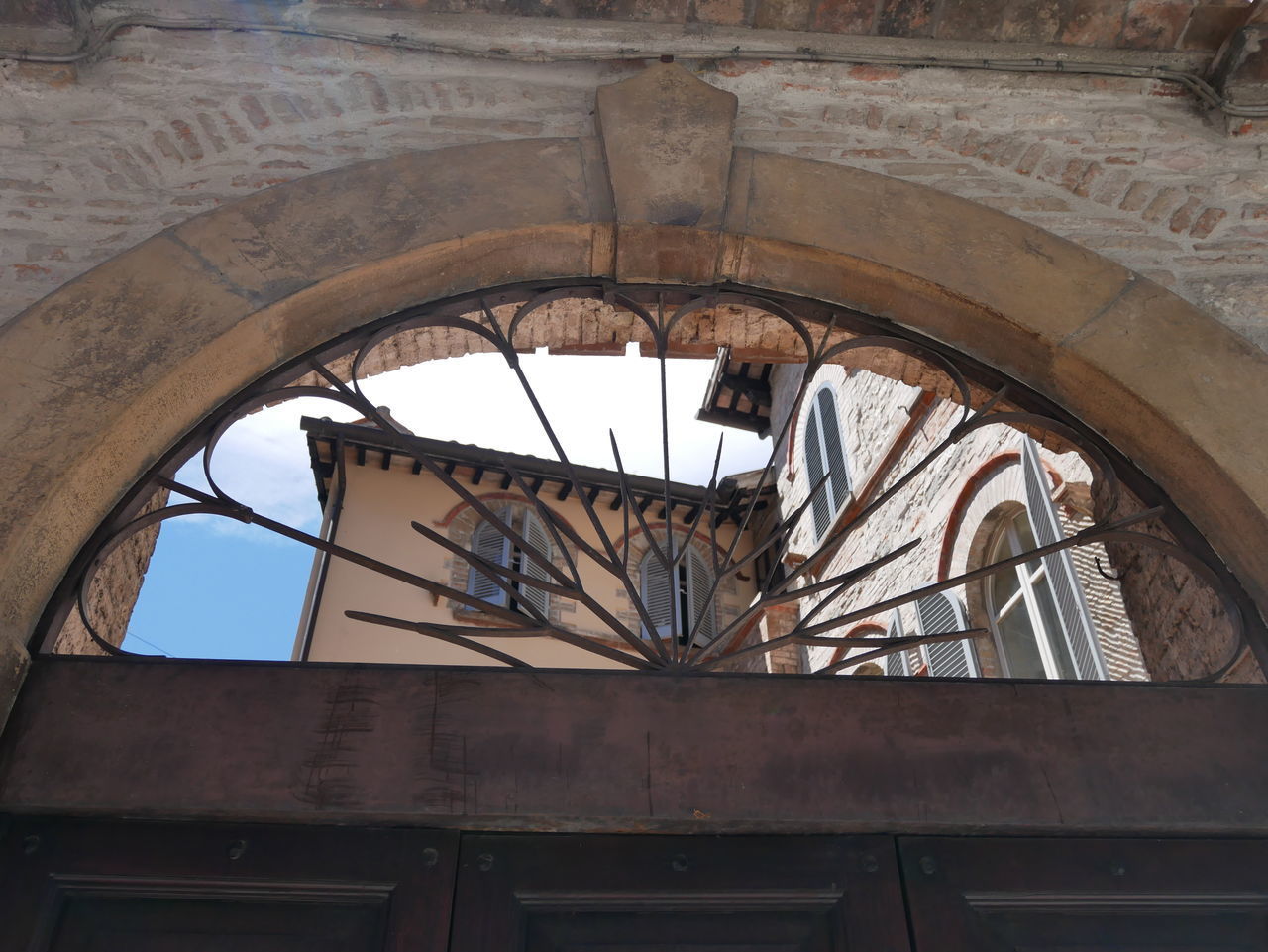 LOW ANGLE VIEW OF ABANDONED BUILDING