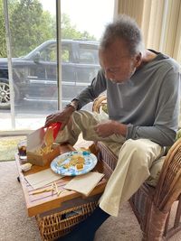 Man eating french fries and chicken mcnuggets