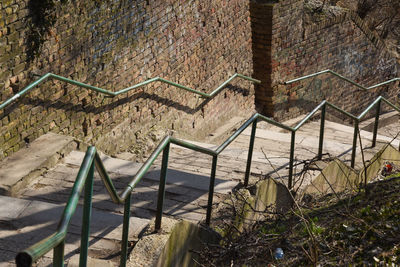 High angle view of railing by building