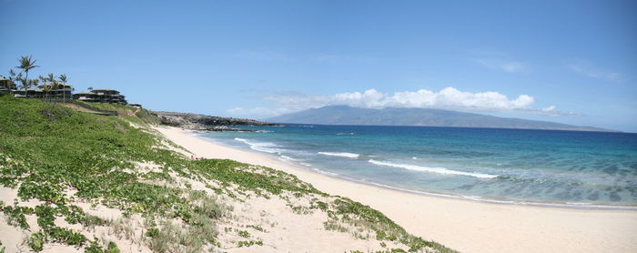 Scenic view of beach against sky