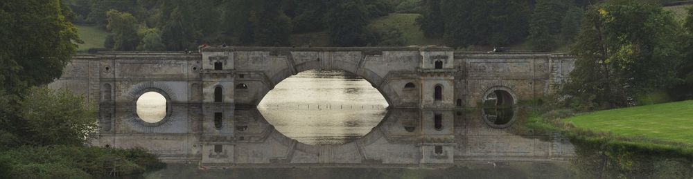 Arch bridge over river