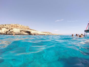 Scenic view of sea against clear blue sky