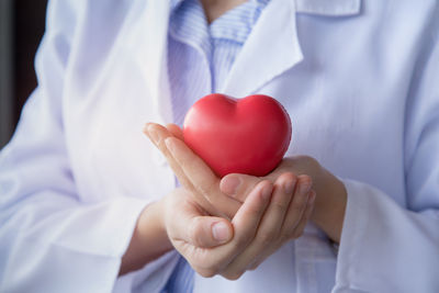 Close-up of hands holding heart