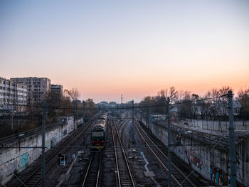 High angle view of train in city against clear sky