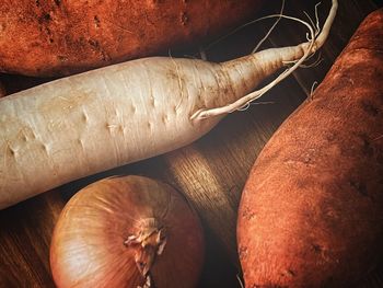 Cropped image of hand holding food