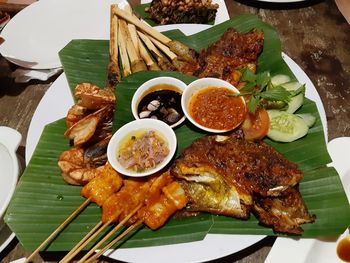 High angle view of food served on table