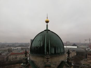 View of buildings in city against sky