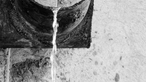 High angle view of water flowing through rocks