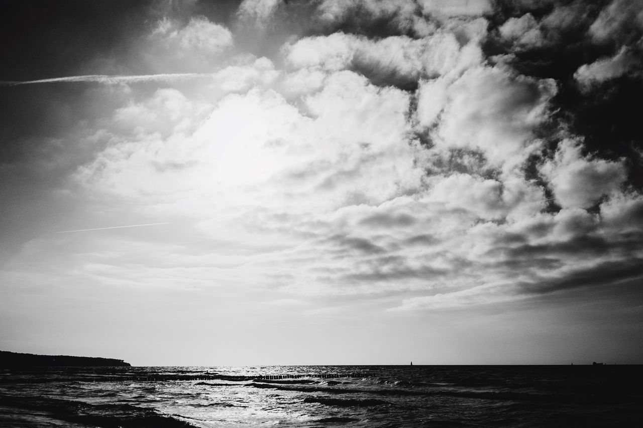 sea, water, horizon over water, tranquil scene, sky, tranquility, scenics, beauty in nature, waterfront, nature, cloud - sky, cloud, idyllic, cloudy, seascape, rippled, calm, outdoors, beach, no people