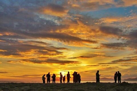 sunset, sky, silhouette, orange color, togetherness, cloud - sky, men, scenics, leisure activity, lifestyles, standing, beauty in nature, tranquil scene, person, nature, dramatic sky, beach, tranquility, walking