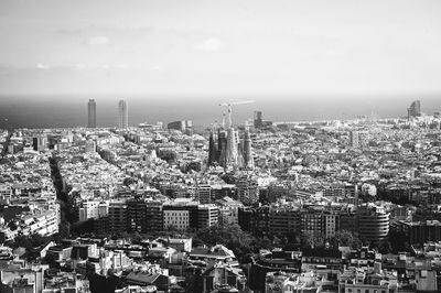 High angle view of buildings against sky in city
