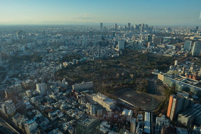 Aerial view of cityscape against sky