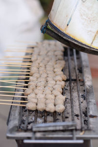 High angle view of meat on barbecue grill