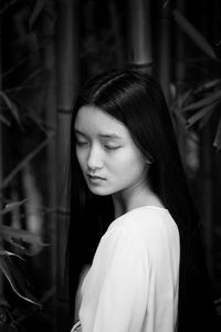 Beautiful chinese teen among bamboo forest iii