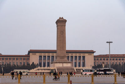 Group of people in front of building