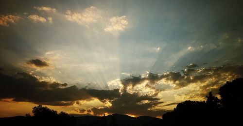 Scenic view of dramatic sky at sunset