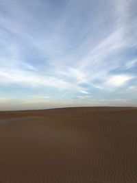 Scenic view of desert against sky