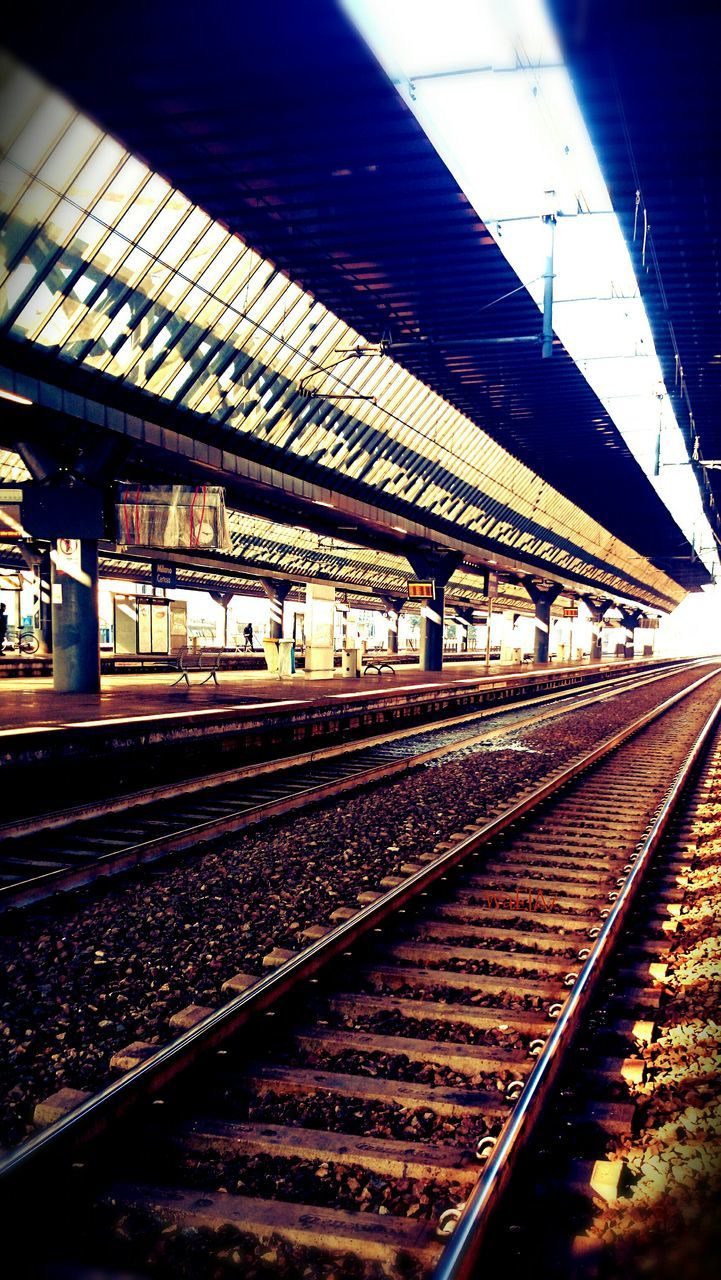 railroad track, rail transportation, public transportation, railroad station platform, railroad station, transportation, train - vehicle, railway track, travel, public transport, passenger train, train, railway station, station, subway station, mode of transport, diminishing perspective, railway station platform, indoors, built structure