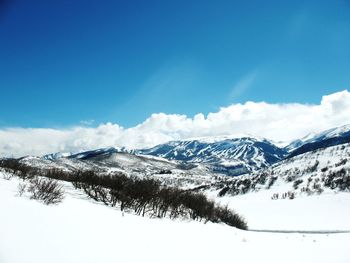 Scenic view of snowcapped mountains against sky, snowmass and highlands colorado