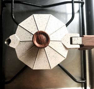 High angle view of coffee maker on stove