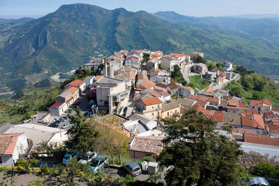 High angle view of townscape and mountains