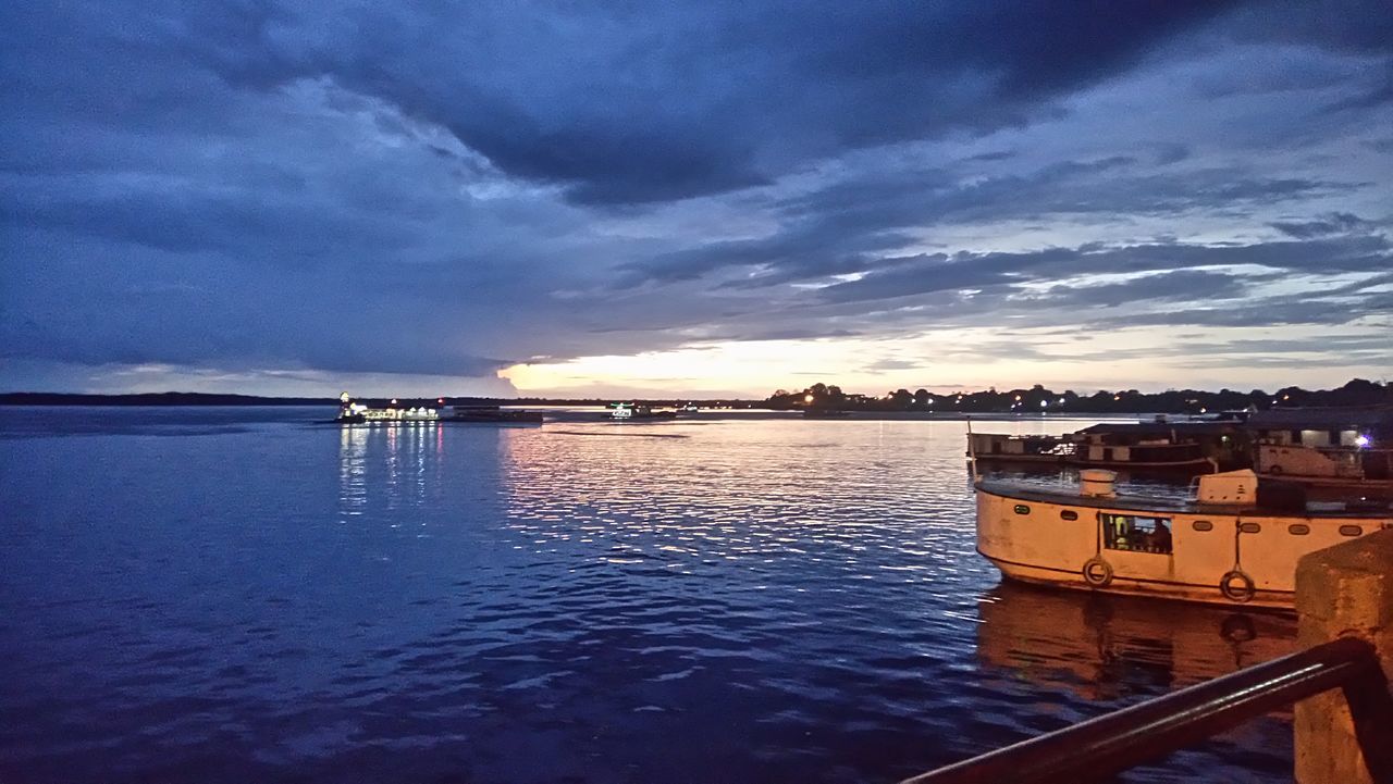 water, reflection, sky, cloud - sky, sea, architecture, transportation, nautical vessel, no people, waterfront, built structure, outdoors, nature, building exterior, beauty in nature, illuminated, day