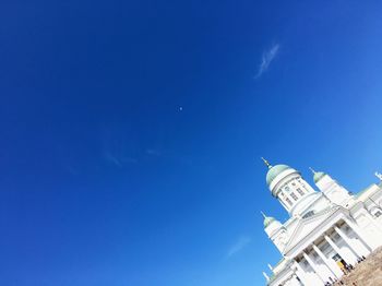 Low angle view of building against blue sky