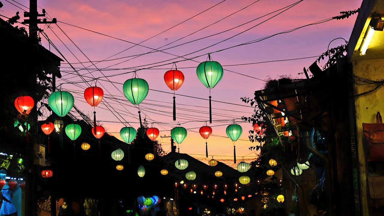 lighting equipment, sky, built structure, architecture, decoration, illuminated, lantern, building exterior, celebration, low angle view, hanging, cable, electricity, nature, no people, red, city, chinese lantern, technology, outdoors, festival, chinese new year