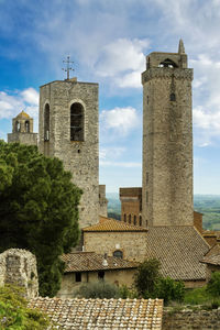 San gimignano the torre grossa and the bell tower of the cathedral