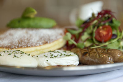 Close-up of food in plate on table