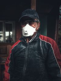 Portrait of man wearing gas mask