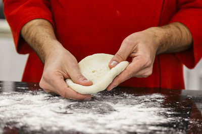 Close-up of person preparing food