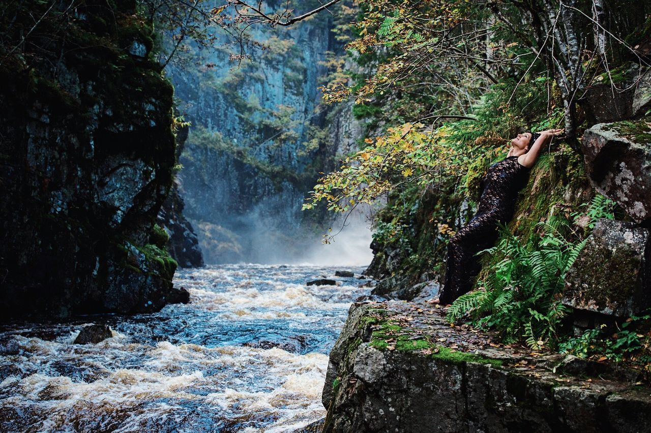 rock - object, water, beauty in nature, scenics, nature, tree, rock formation, tranquil scene, waterfall, tranquility, forest, rock, motion, flowing water, stream, cliff, flowing, idyllic, moss, non-urban scene