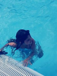 High angle view of woman in swimming pool