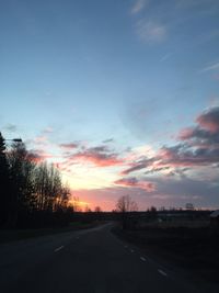 Empty road at sunset