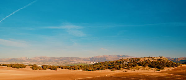 Scenic view of desert against sky