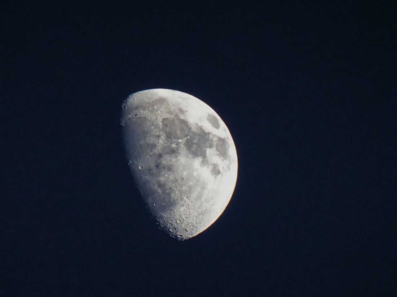 LOW ANGLE VIEW OF MOON IN SKY