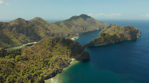 Bay and the tropical islands. seascape with tropical rocky islands, ocean blue wate, aerial view. 