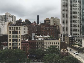 Buildings in city against sky