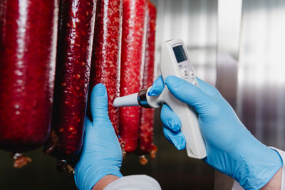 Low section of woman exercising in gym