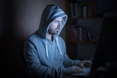 Portrait of man using computer