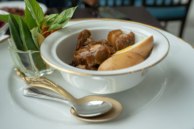 Close-up of bread in bowl on table