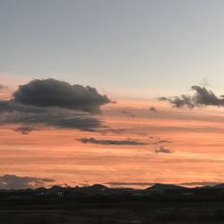 Scenic view of silhouette landscape against sky during sunset