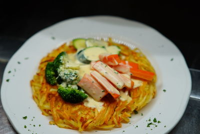 Close-up of pasta served in plate