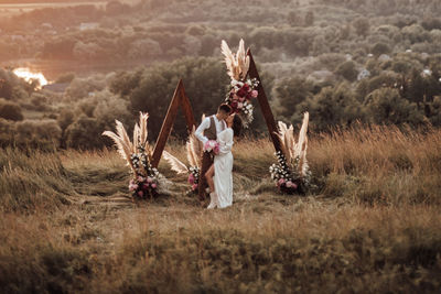 Women standing on field