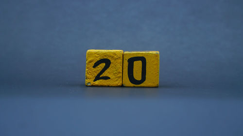 High angle view of toy blocks on blue background